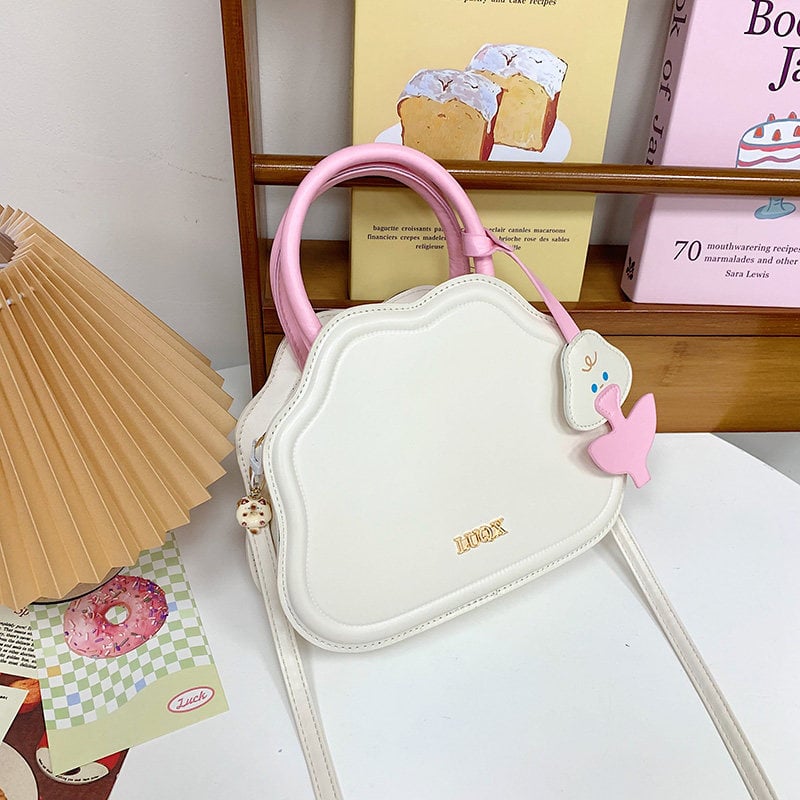 Mini ženska crossbody torba od poliester materijala, zapadni stil, ovalni oblik, zatvaranje kapom, unutarnji džep sa zipom, jedna naramenica, proljeće 2025