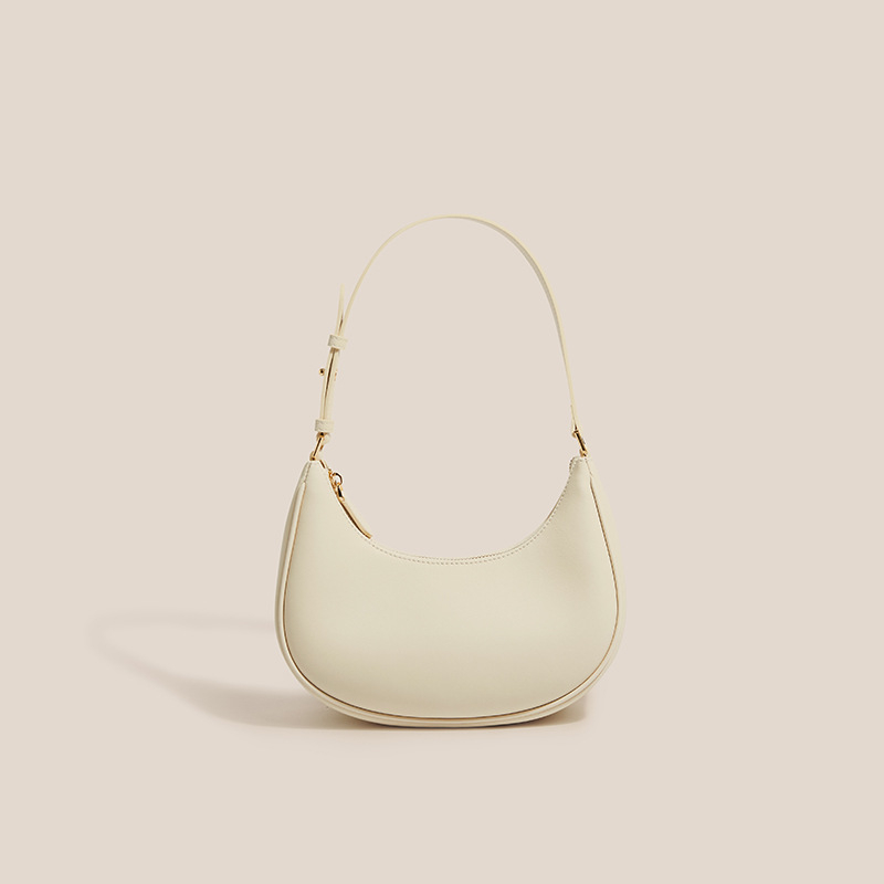 Ženska torbica od prave kože, elegantan dojam, novi model 2026, oblik polumjeseca baguette, crossbody torba s jednim remenom, suptilna tekstura
