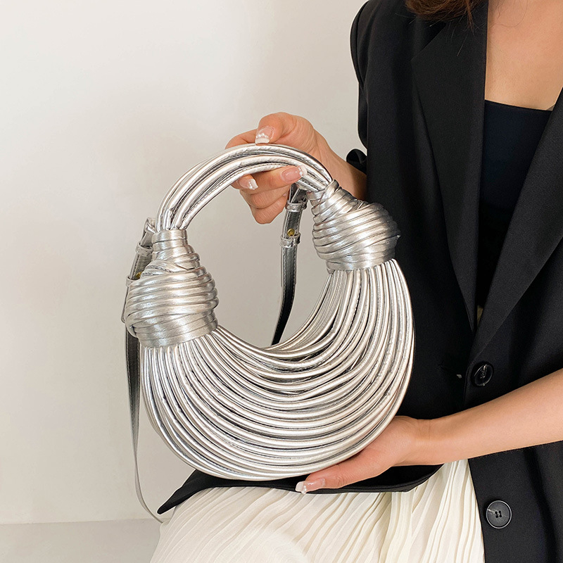 Ženska torba u obliku knedle s kovnim laserskim završetkom, PU koža, preko ramena