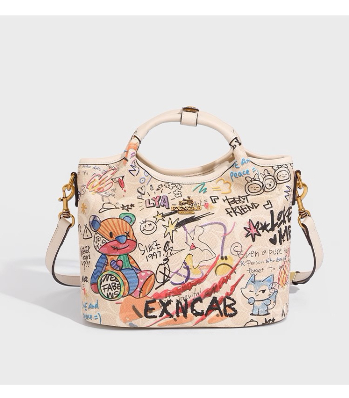 Ženska crossbody torba s graffiti otiskom, velika kapaciteta, model 2025