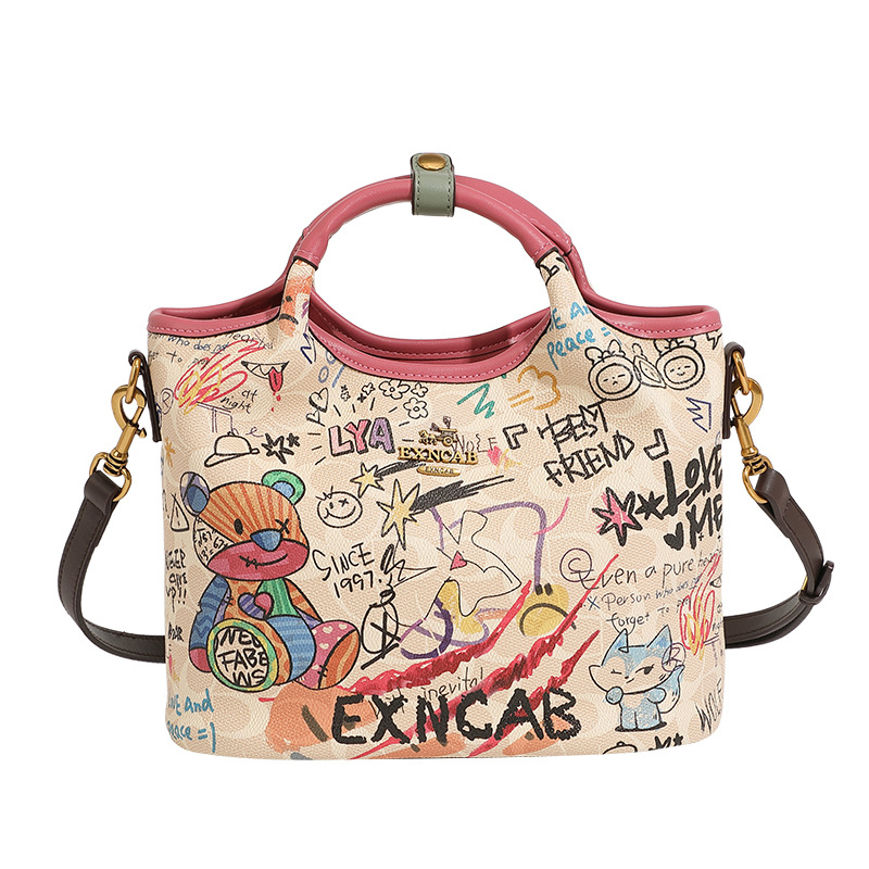 Ženska crossbody torba s graffiti otiskom, velika kapaciteta, model 2025