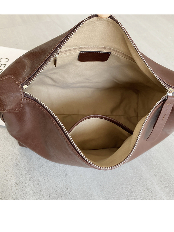 Ženska torbica od prave kože, crossbody, srednje veličine, oblik dumpling, gradski minimalistički stil, unutarnji džepovi