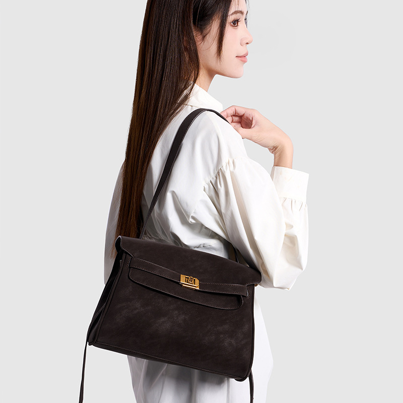 Ženska Kelly torba od nubuk kože, novi model 2025, visokokvalitetna retro svakodnevna tote torba s remenom za ramenu i crossbody remenom
