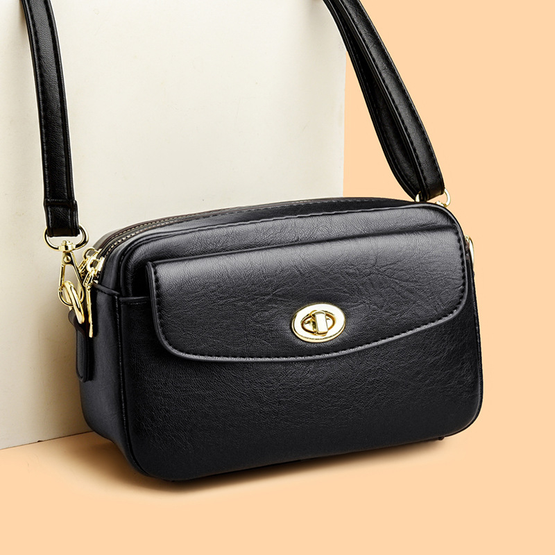 Ženska crossbody torbica, jednobojna boja, minimalistički stil, torbica za telefon, svakodnevna torbica