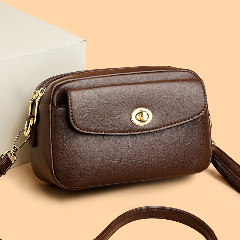 Ženska crossbody torbica, jednobojna boja, minimalistički stil, torbica za telefon, svakodnevna torbica