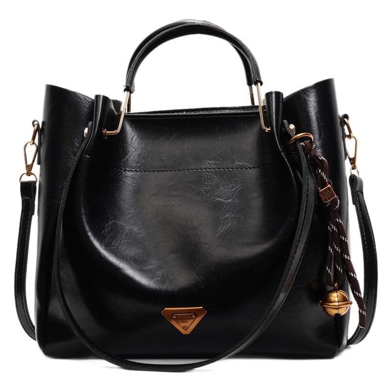 Ženska tote torba velike kapacitete — moderan, minimalistički retro stil, svestrana za nošenje preko ramena ili crossbody.