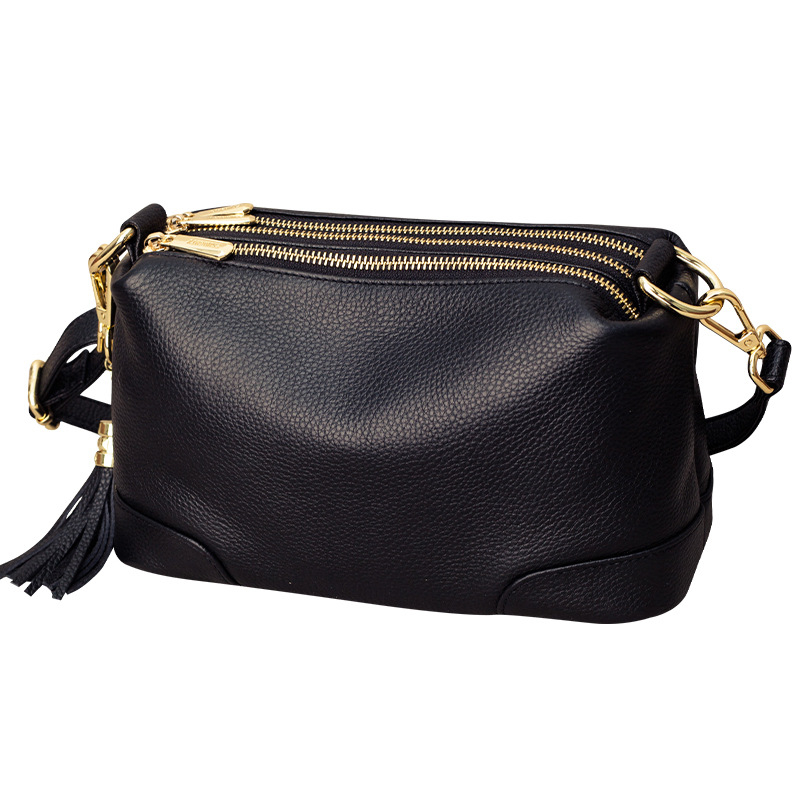 Ženska mala kožna crossbody torba, s više zipova i pretinaca, pompon, preko ramena