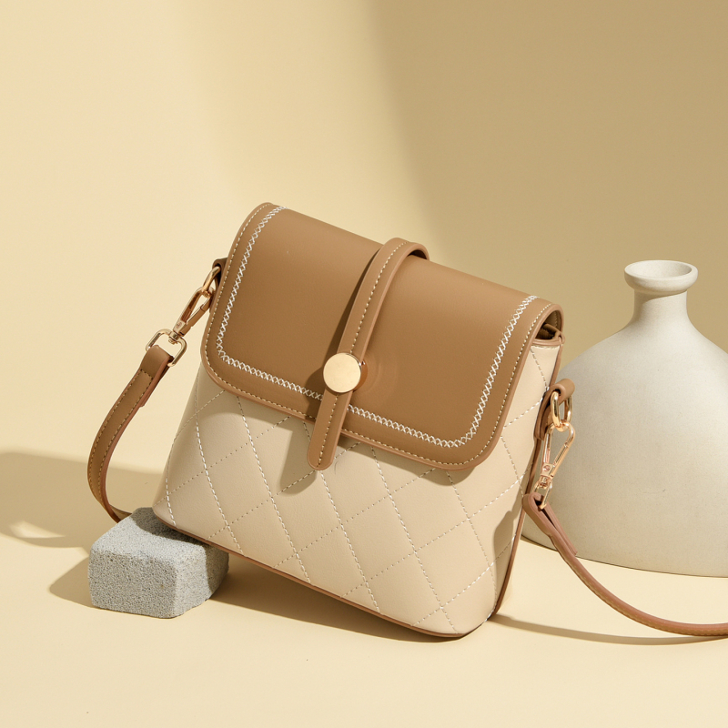 Ženska bucket torba, urbani minimalistički dizajn, korejski stil, casual crossbody, srednja veličina, proljeće 2026