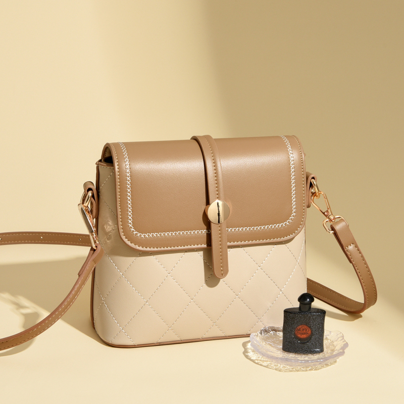 Ženska bucket torba, urbani minimalistički dizajn, korejski stil, casual crossbody, srednja veličina, proljeće 2026