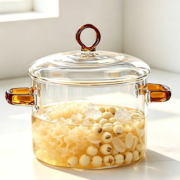 Vas din sticlă borosilicată, transparent, cu mâner roșu, pentru flacără deschisă, pentru oden, supe și tăiței, 1.1–2 L