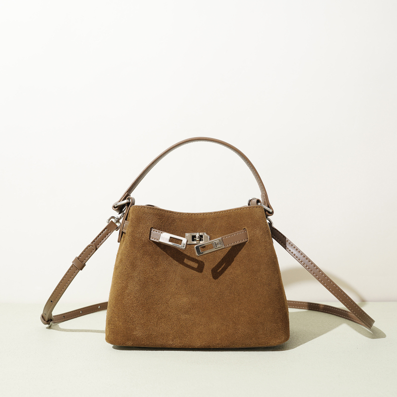 Ženska mini kožna bucket torba, casual stil, s remenom preko ramena ili u ruci, retro inspiracija