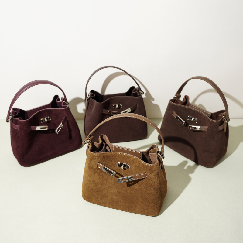 Ženska mini kožna bucket torba, casual stil, s remenom preko ramena ili u ruci, retro inspiracija
