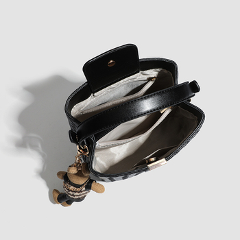 Teksturirana ženska bucket torba, srednje veličine, gradski stil, rame ili crossbody, tkan detalj