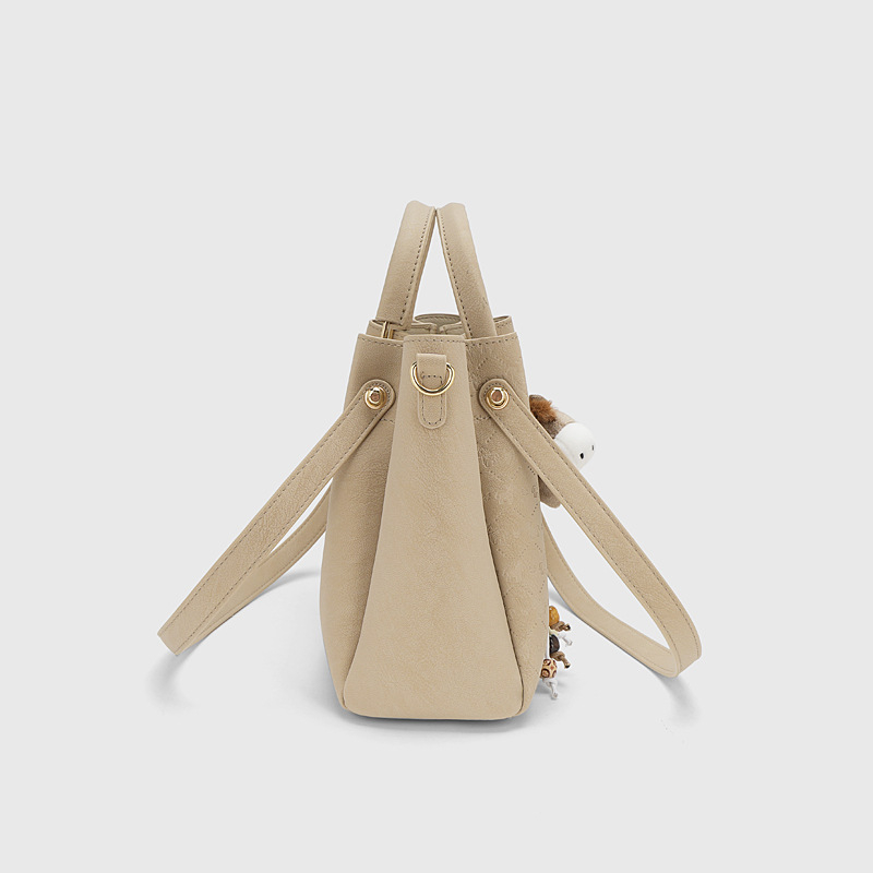 Uncio rejass Ženska torba tip kanta, velikog kapaciteta, preko ramena ili crossbody, gradski stil, proljeće 2026