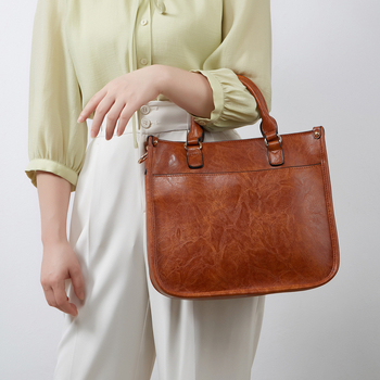 Ženska vintage tote torba 2025 — europsko-američki retro stil, crossbody s širokom remenom, svakodnevna upotreba.