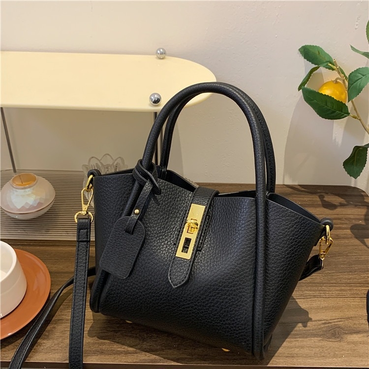 Nišna torbica s oblikom krila, TOGO tekstura, mala crossbody torbica