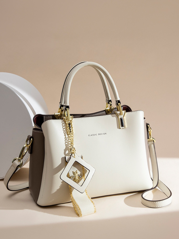 Ženska torbica od prave kože s ručicom i crossbody remenom