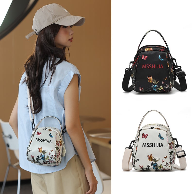 Nova lagana crossbody torbica s velikom kapacitetom, višestrukim džepovima, s odvojivom naramenicom i novčanikom, s motivom leptira i cvijeća