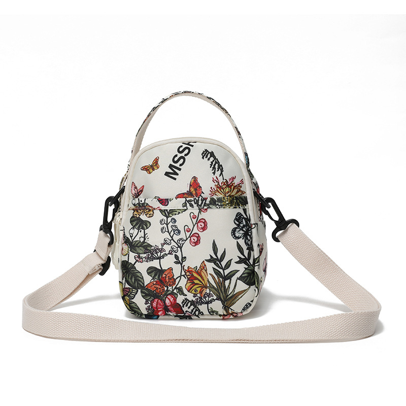 Nova lagana crossbody torbica s velikom kapacitetom, višestrukim džepovima, s odvojivom naramenicom i novčanikom, s motivom leptira i cvijeća