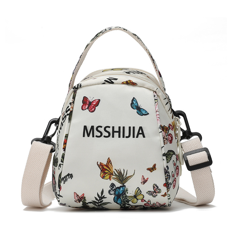 Nova lagana crossbody torbica s velikom kapacitetom, višestrukim džepovima, s odvojivom naramenicom i novčanikom, s motivom leptira i cvijeća