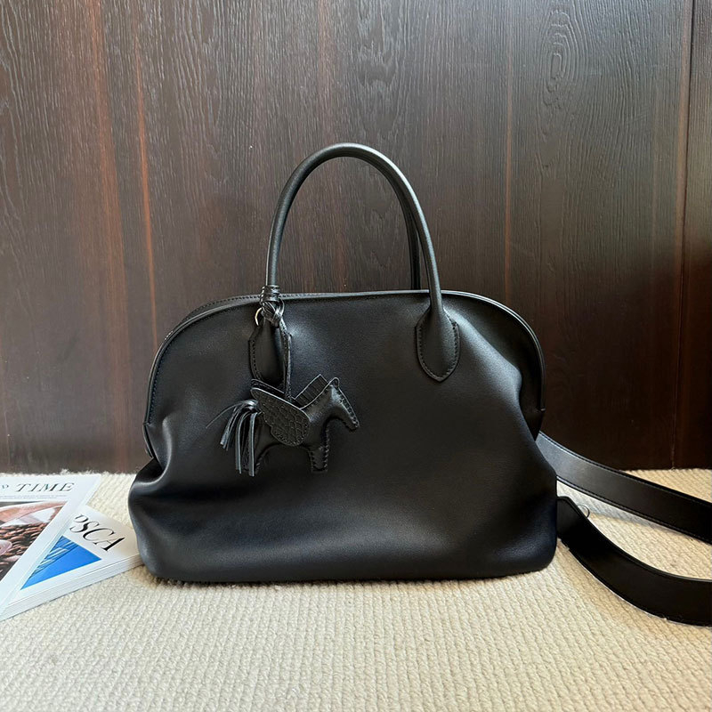 2025 ženska torba nišnog dizajna s motivima oblaka i školjke — na rame ili crossbody