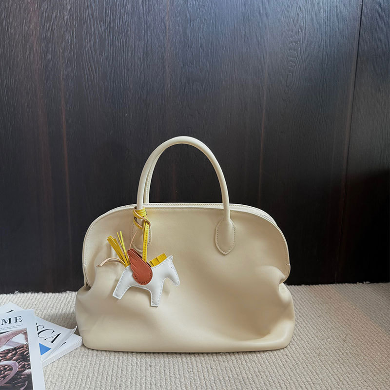 2025 ženska torba nišnog dizajna s motivima oblaka i školjke — na rame ili crossbody