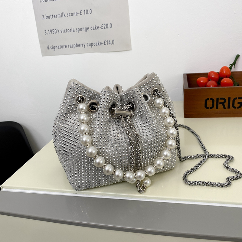 PU ženska torbica cilindričnog oblika, zatvaranje sa šnarama, gradski stil, mala veličina, nosi se preko ramena ili crossbody