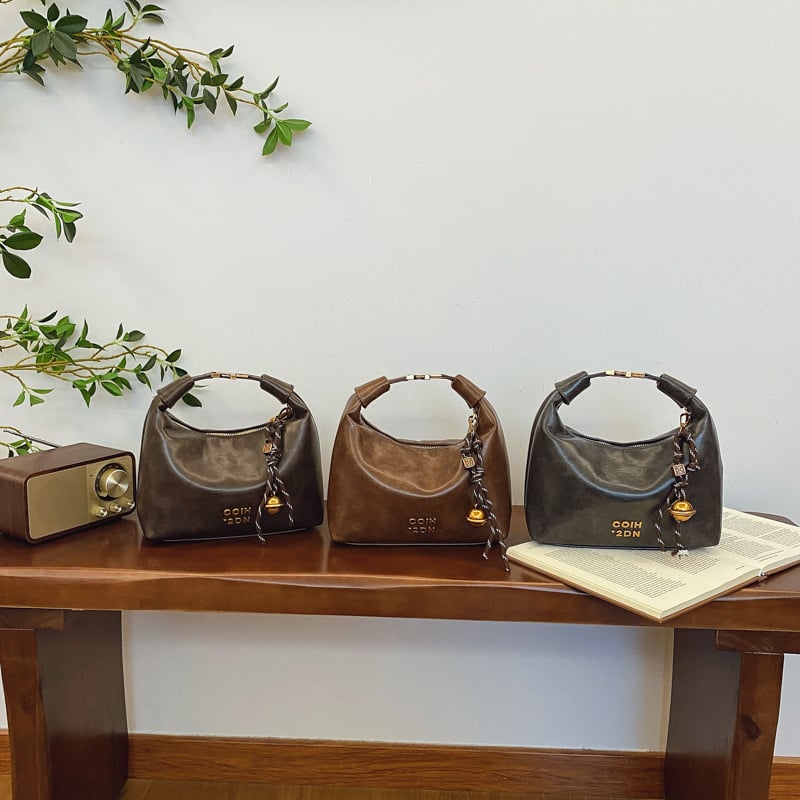 Ženska vintage crossbody torba, PU koža, polumjesnog oblika, mini kvadratni oblik, zimska kolekcija 2025