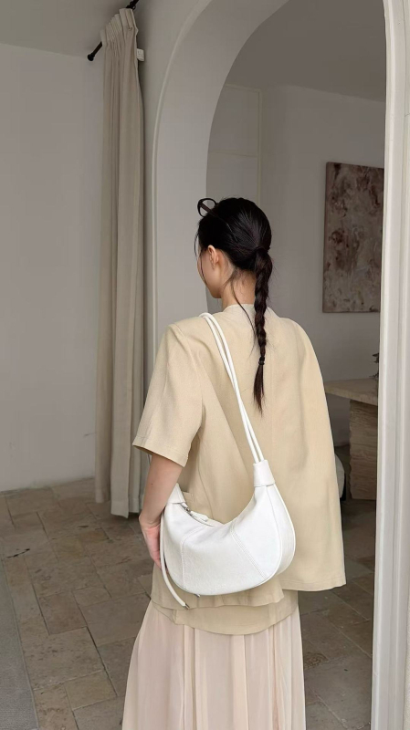 Ženska torbica pod pazuhom s korejskim dizajnom, proljeće 2026, dumpling torba, oblik polumjeseca, crossbody s jednom remenom