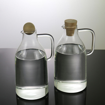 Ceainic din sticlă borosilicat rezistentă la temperaturi înalte, cu capac mare și mâner în stil ceainic, pentru apă rece și băuturi cu suc