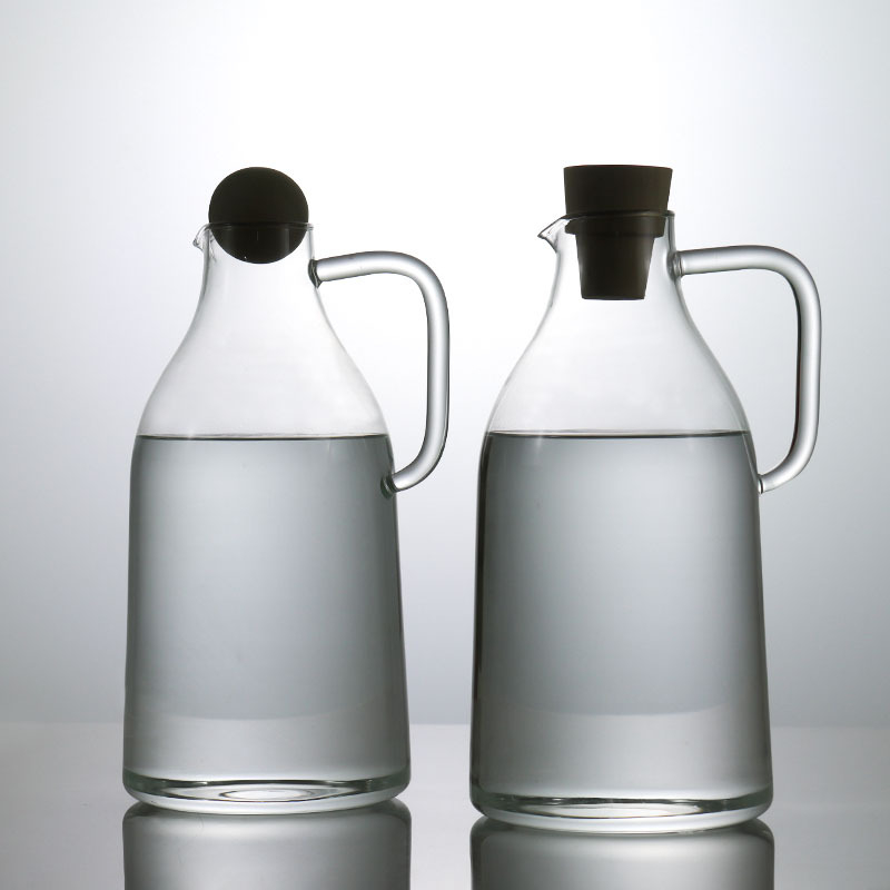 Ceainic din sticlă borosilicat rezistentă la temperaturi înalte, cu capac mare și mâner în stil ceainic, pentru apă rece și băuturi cu suc