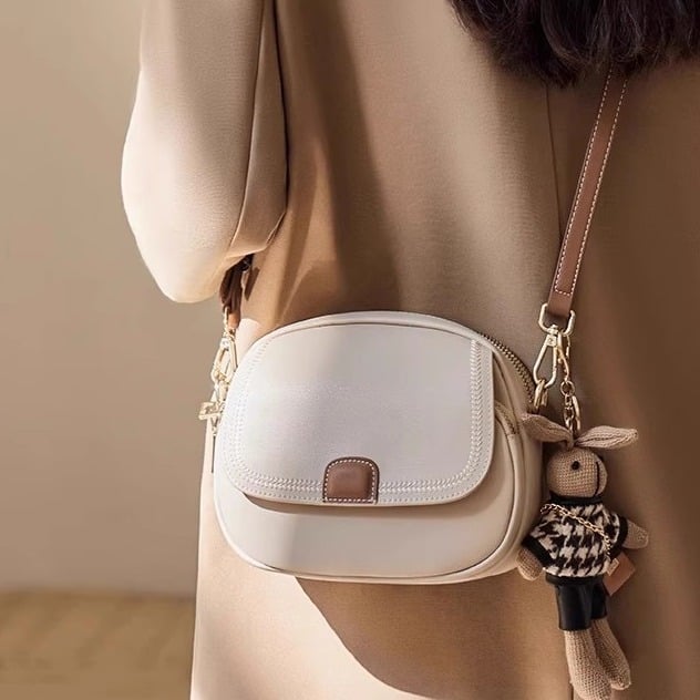 Ženska PU mala okrugla torbica, urbano jednostavan stil, novi model 2025, crossbody ili torba za rame za proljeće i ljeto