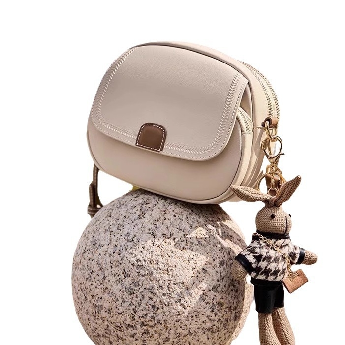 Ženska PU mala okrugla torbica, urbano jednostavan stil, novi model 2025, crossbody ili torba za rame za proljeće i ljeto