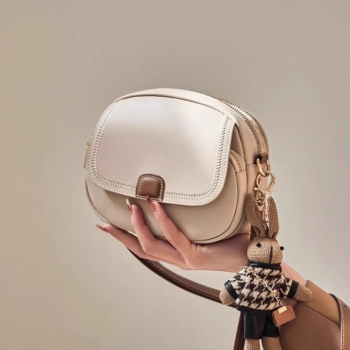 Ženska PU mala okrugla torbica, urbano jednostavan stil, novi model 2025, crossbody ili torba za rame za proljeće i ljeto
