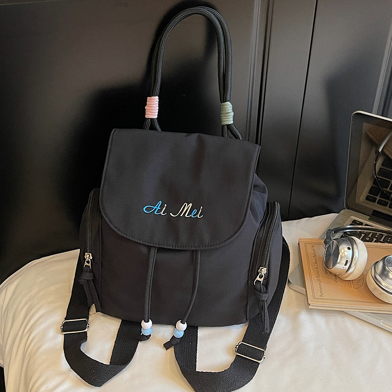 Ženski nylon ruksak s vezanjem, mali ovalni bucket bag za svakodnevnu upotrebu, ljeto 2025