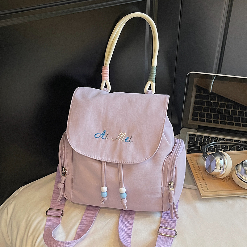 Ženski nylon ruksak s vezanjem, mali ovalni bucket bag za svakodnevnu upotrebu, ljeto 2025