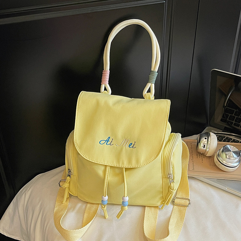 Ženski nylon ruksak s vezanjem, mali ovalni bucket bag za svakodnevnu upotrebu, ljeto 2025