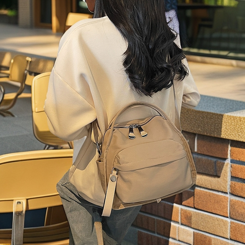 Ženska lagana crossbody torbica od Oxford tkanine, kompaktna, gradski casual stil