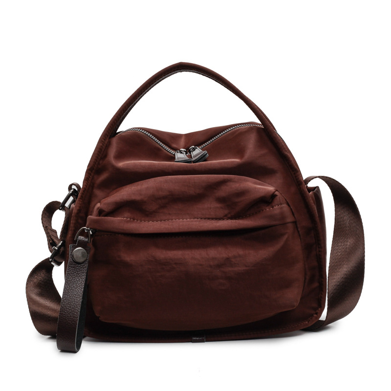 Ženska lagana crossbody torbica od Oxford tkanine, kompaktna, gradski casual stil