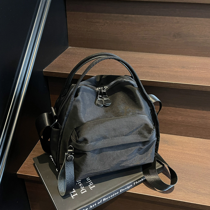 Ženska lagana crossbody torbica od Oxford tkanine, kompaktna, gradski casual stil
