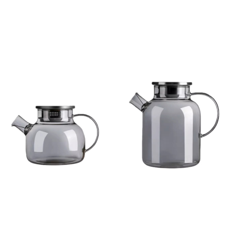 Carafă de apă rece în nuanțe gri, cu capac din oțel inoxidabil și corp din sticlă borosilicat, potrivită pentru utilizare zilnică acasă.