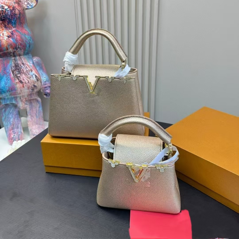 Torba bucket od prave kože s metalnim umetcima, s naramenicom i crossbody remenom, europsko-američki stil, velika kapaciteta, ljeto 2024