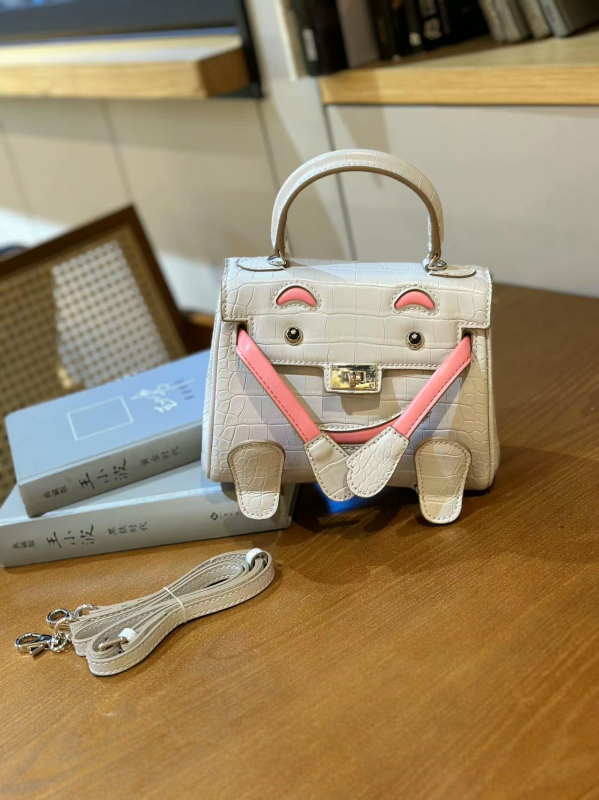 Kelly torbica sa smiješnim licem, novi model 2026, teksturirana mini torba s uzorkom krokodila, svestrana i slatka, za ramena ili crossbody