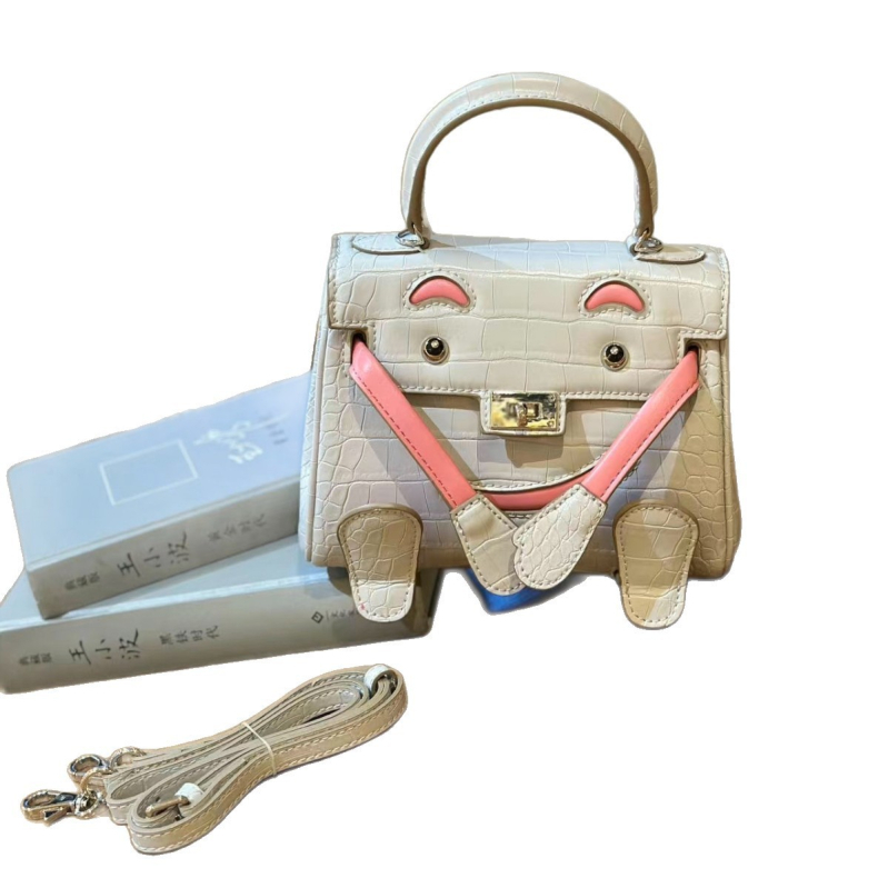 Kelly torbica sa smiješnim licem, novi model 2026, teksturirana mini torba s uzorkom krokodila, svestrana i slatka, za ramena ili crossbody