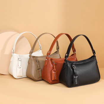 Ženska torbica od kože prvog sloja teleće kože – prava koža, luksuzna, svestrana za nošenje na rame i crossbody, minimalistički horizontalni kvadratni dizajn, srednja veličina