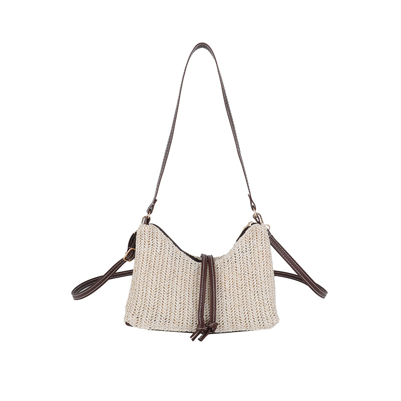 Ženska torbica od pletene trave – lagana, jednobojna, s ramenskim remenom (crossbody), minimalistički stil, 2026