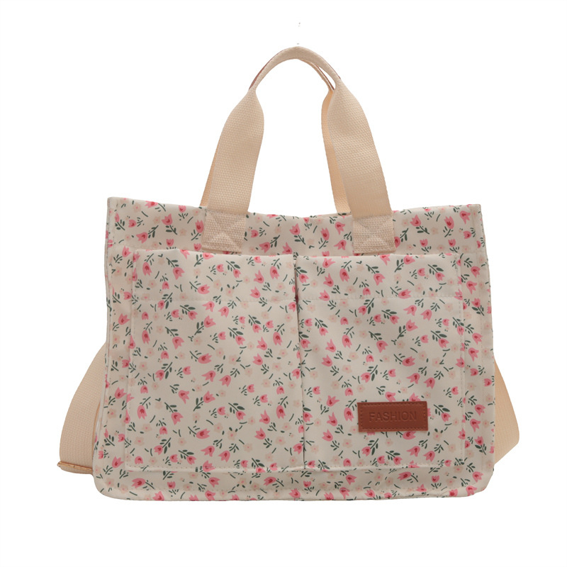Srednja platnena tote torba s dvostrukim džepovima, otiskanim dizajnom, magnetsko zatvaranje, unutarnja pretinica za prijenosno računalo, za svakodnevnu upotrebu.