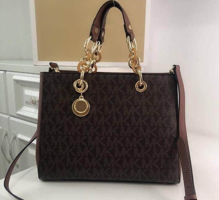 Ženska crossbody torbica od prave kože, s lancem, tortoiseshell uzorak