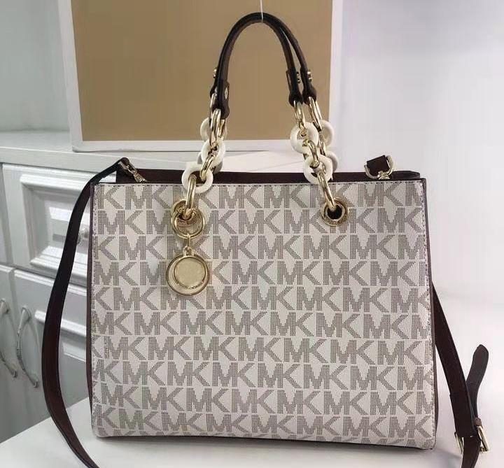Ženska crossbody torbica od prave kože, s lancem, tortoiseshell uzorak