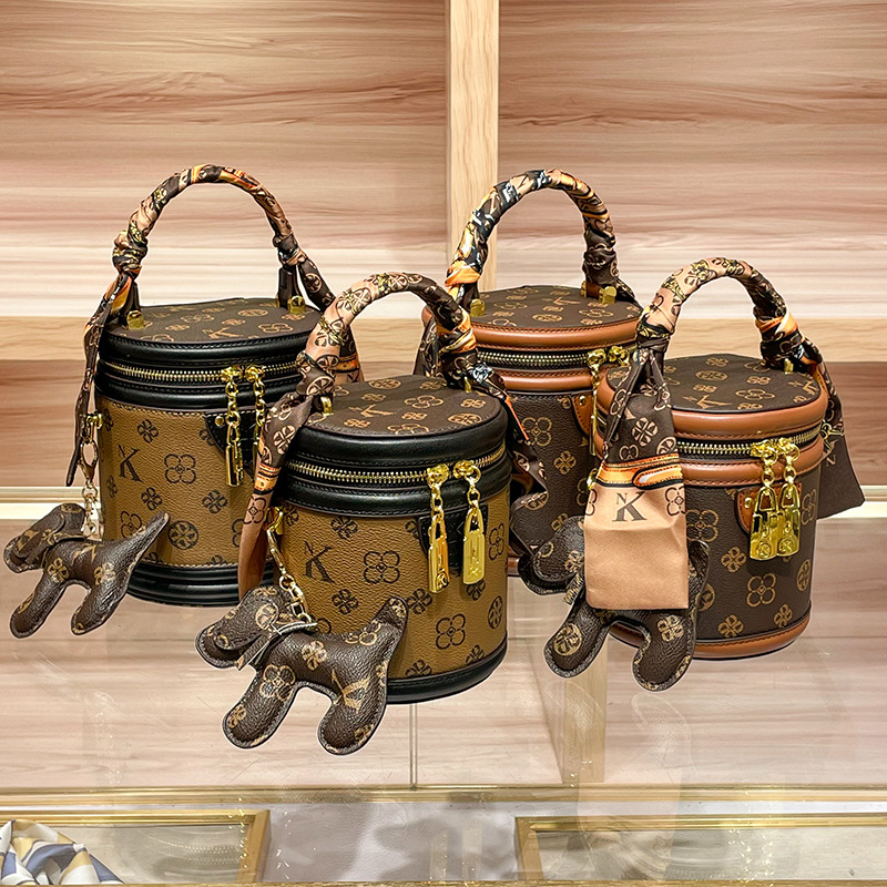 Bucket bag od prave kože za žene s kontrastnim printsom, novi model 2025, mala torba za rame i crossbody